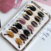 $60.00 USD MIU MIU AAA Quality Sunglasses #1336904
